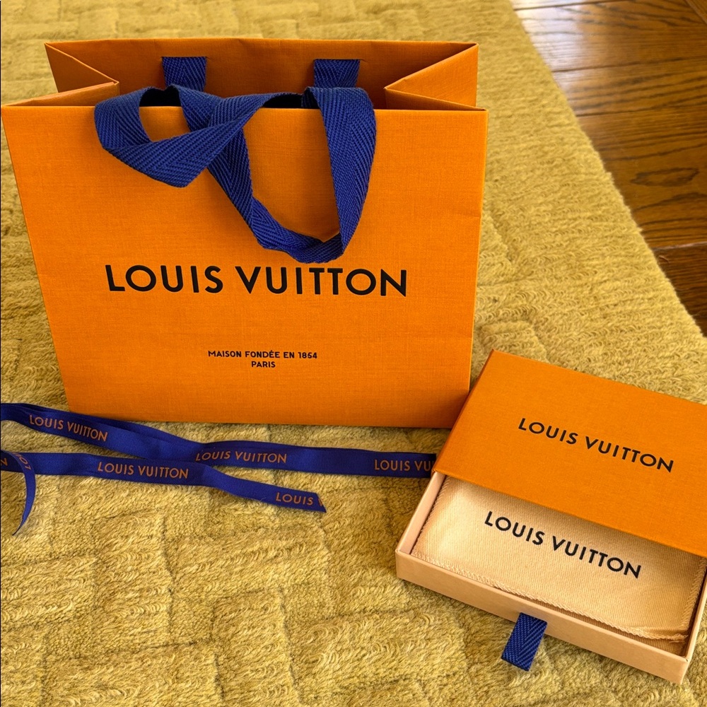 Louis Vuitton box and bag ribbon and small dust bag included